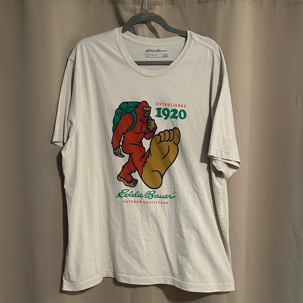 Eddie Bauer Cream Graphic Tee with Sasquatch design
